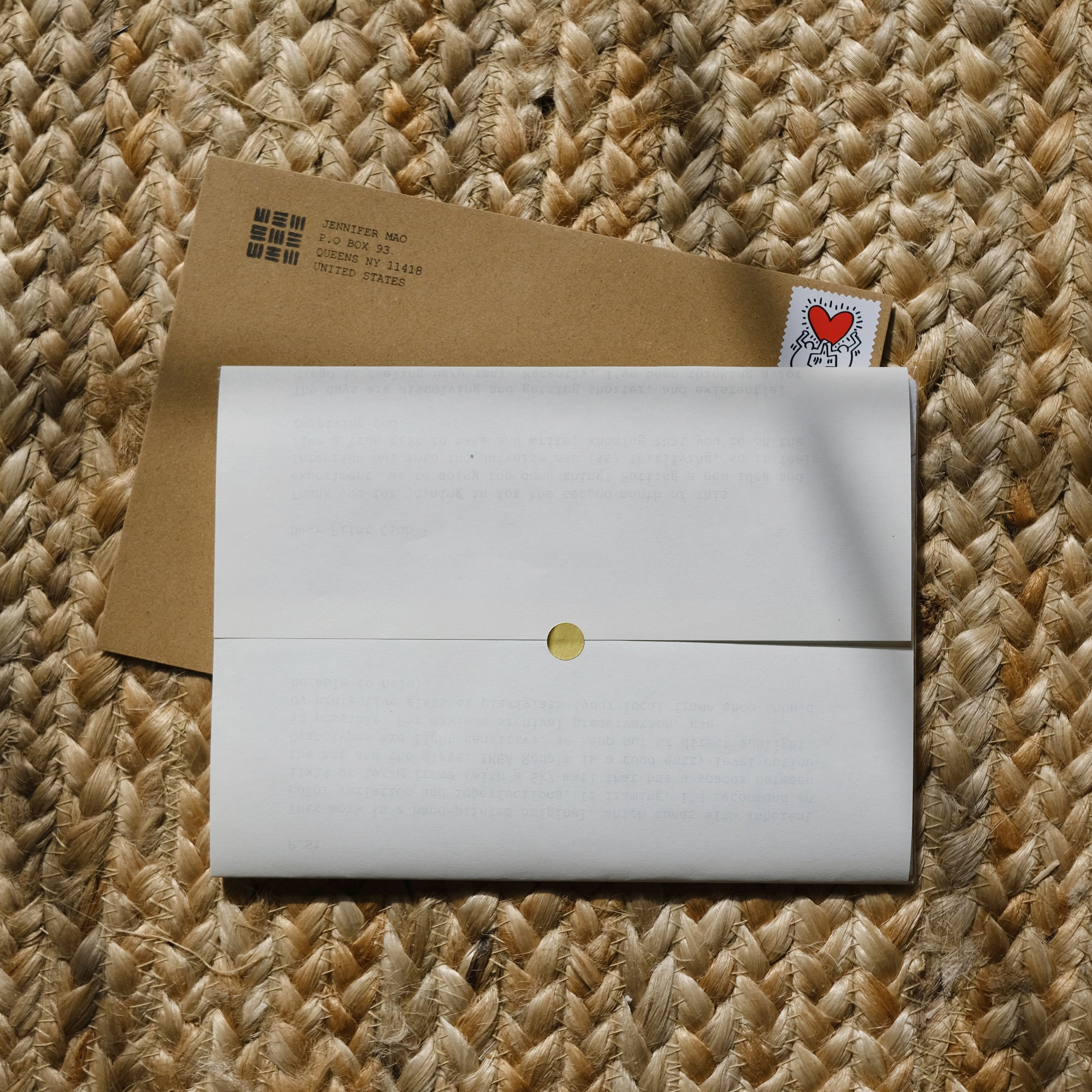 Alternative close-up shot of Mantra Mail Club envelope and sealed letter