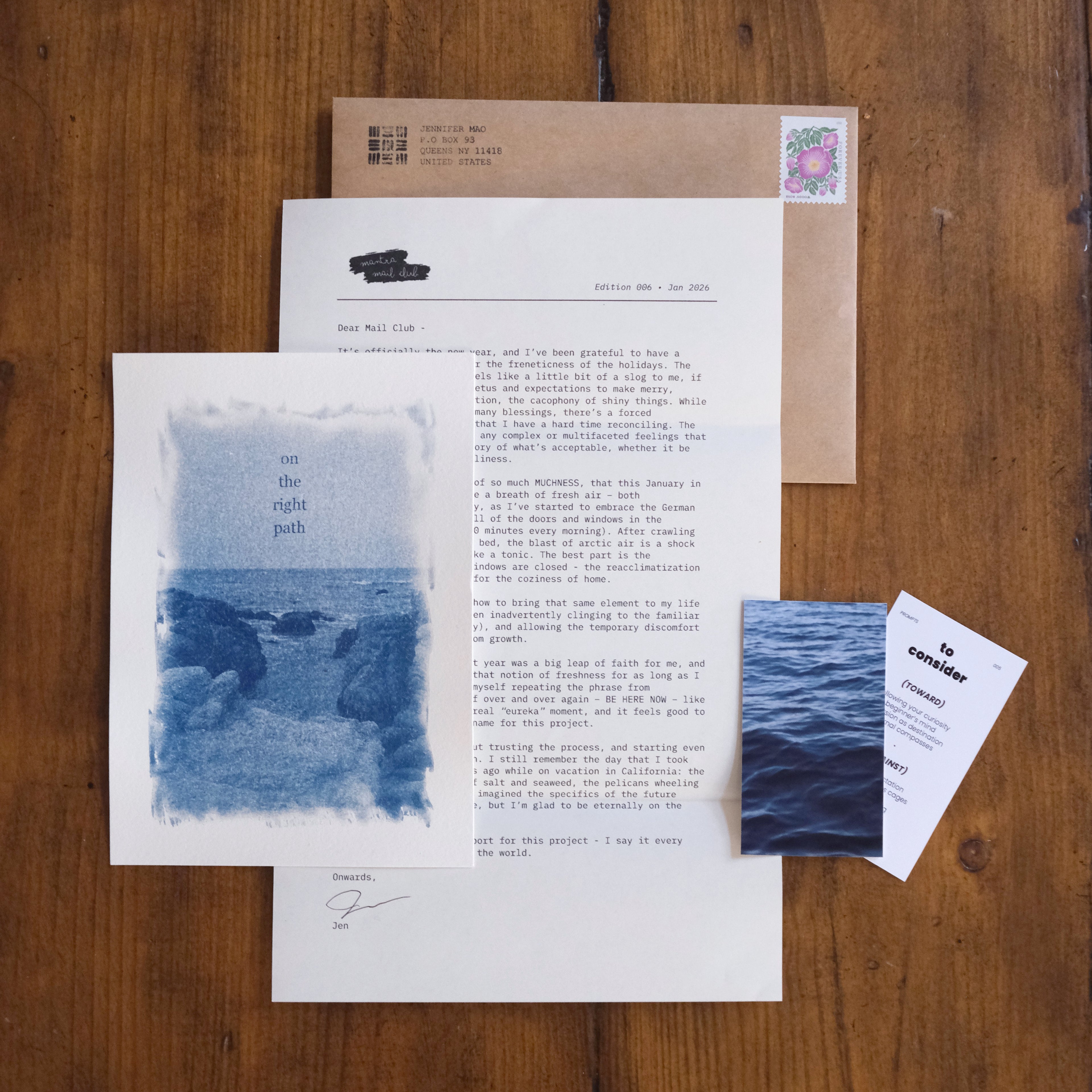 Product photo of Mantra Mail Club, including letter, art print, and prompt card